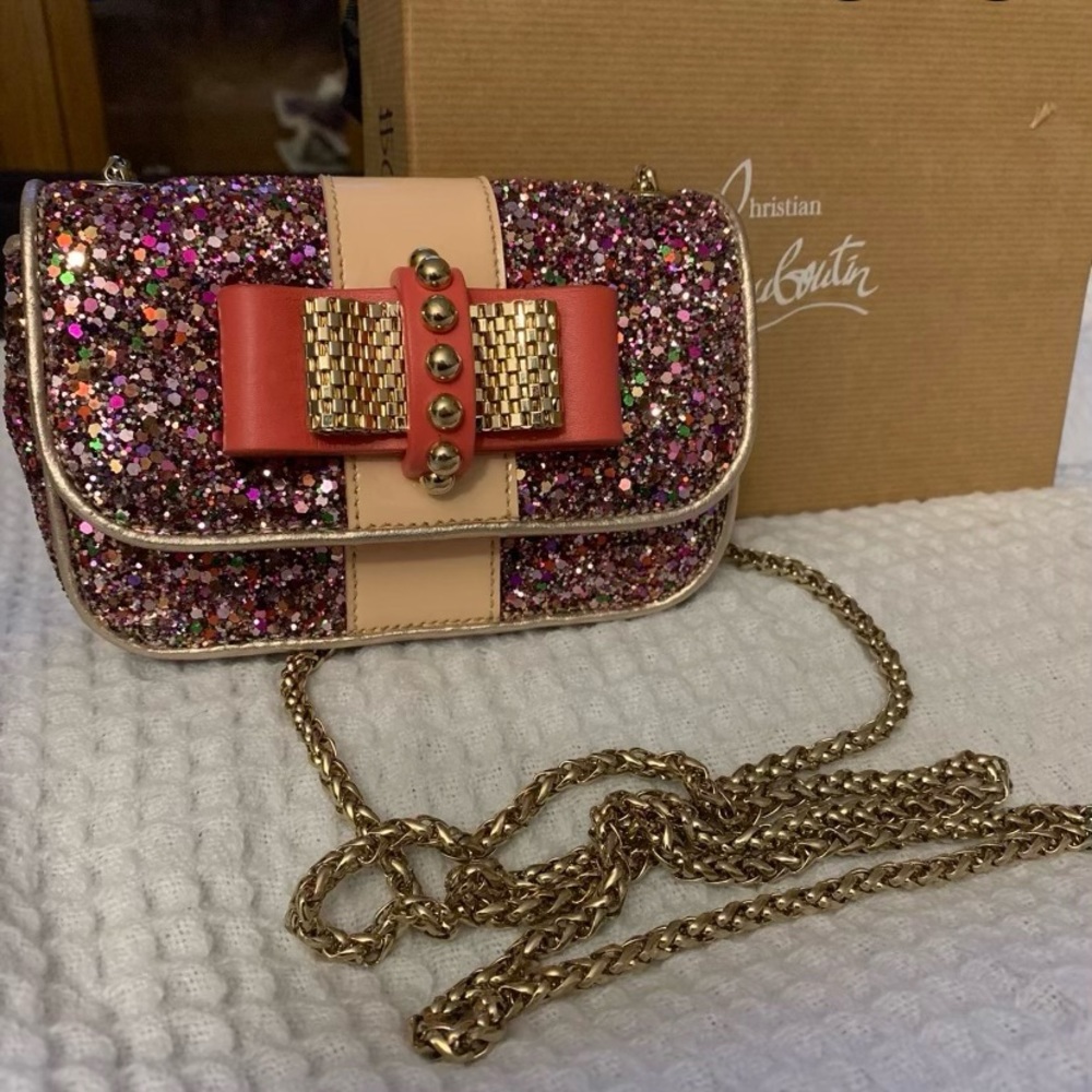 Cross body Christian Loubouton purse